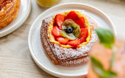 close up shot of vanilla and strawberry pastry