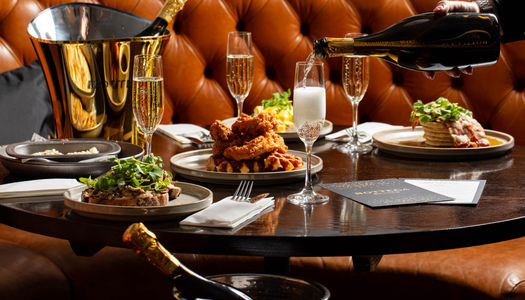 Bottega x Metropole Bar - Bottomles brunch collaboration. Waiter sipping Bottega drink in glass