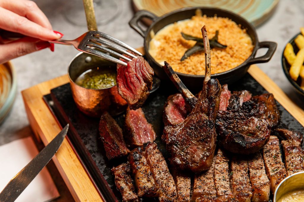 close up shot of the steak and sauces