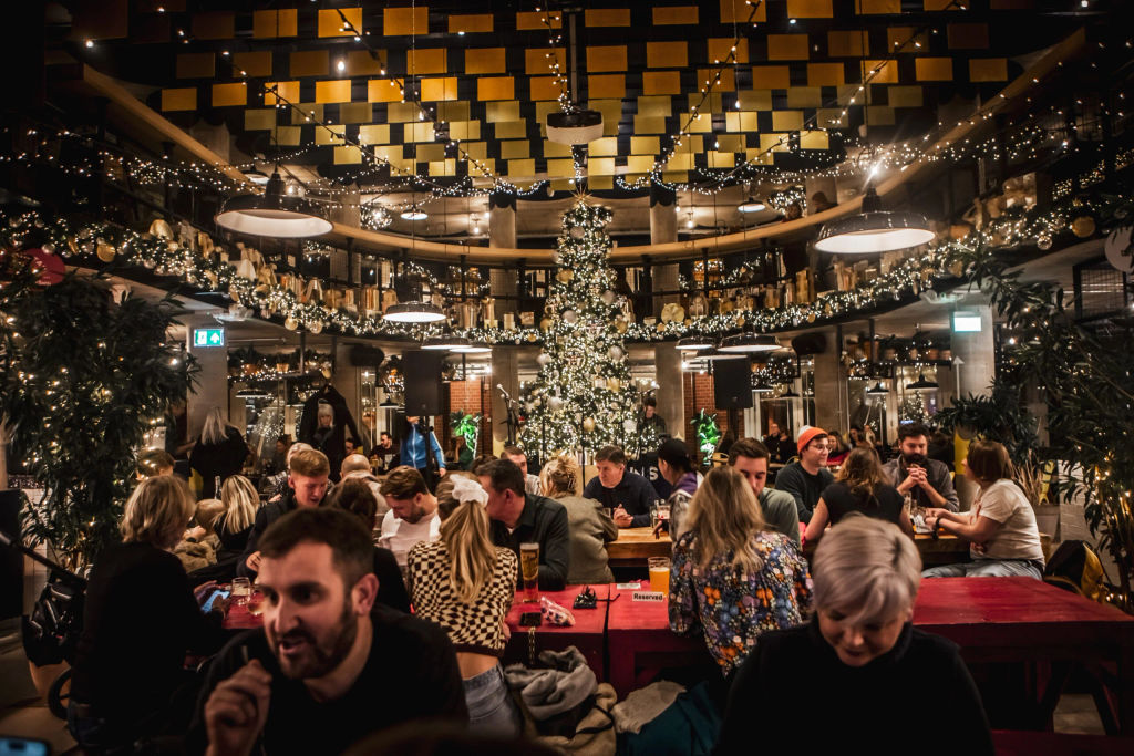 festive decorated main hall at Shelter Hall, Christmas deorations