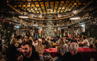 festive decorated main hall at Shelter Hall