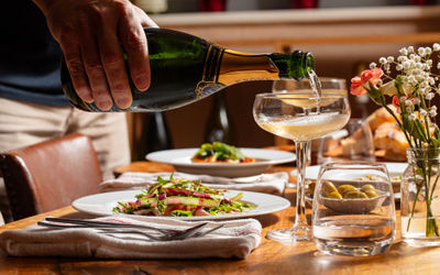 bubbles being poured in the glass