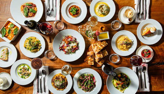 over head shot of the table full of the dishes from the new menu at Poco