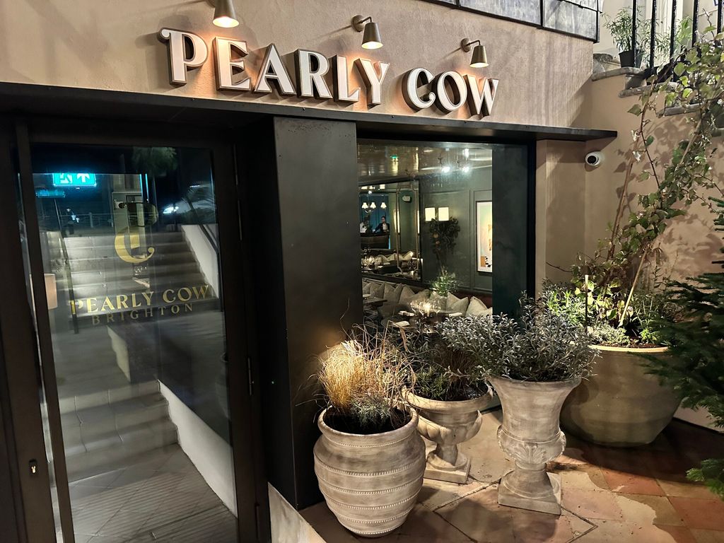 extrerior shot of the Pearly Cow
