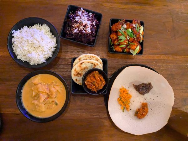 over head shot of the dishes served at the table at Coconut Island