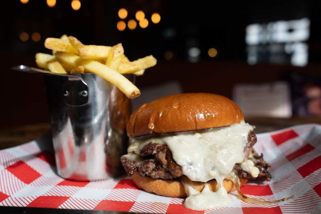 close up shot of boysterous burger with chips