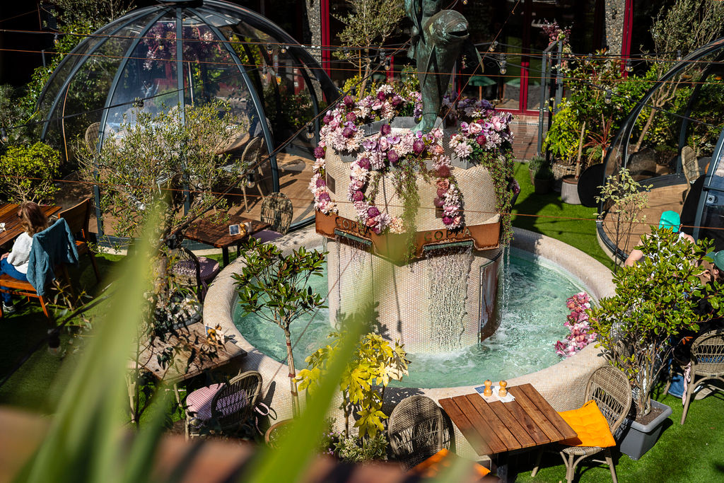 The Dolphin Square water fountain with igloos surrounding it.