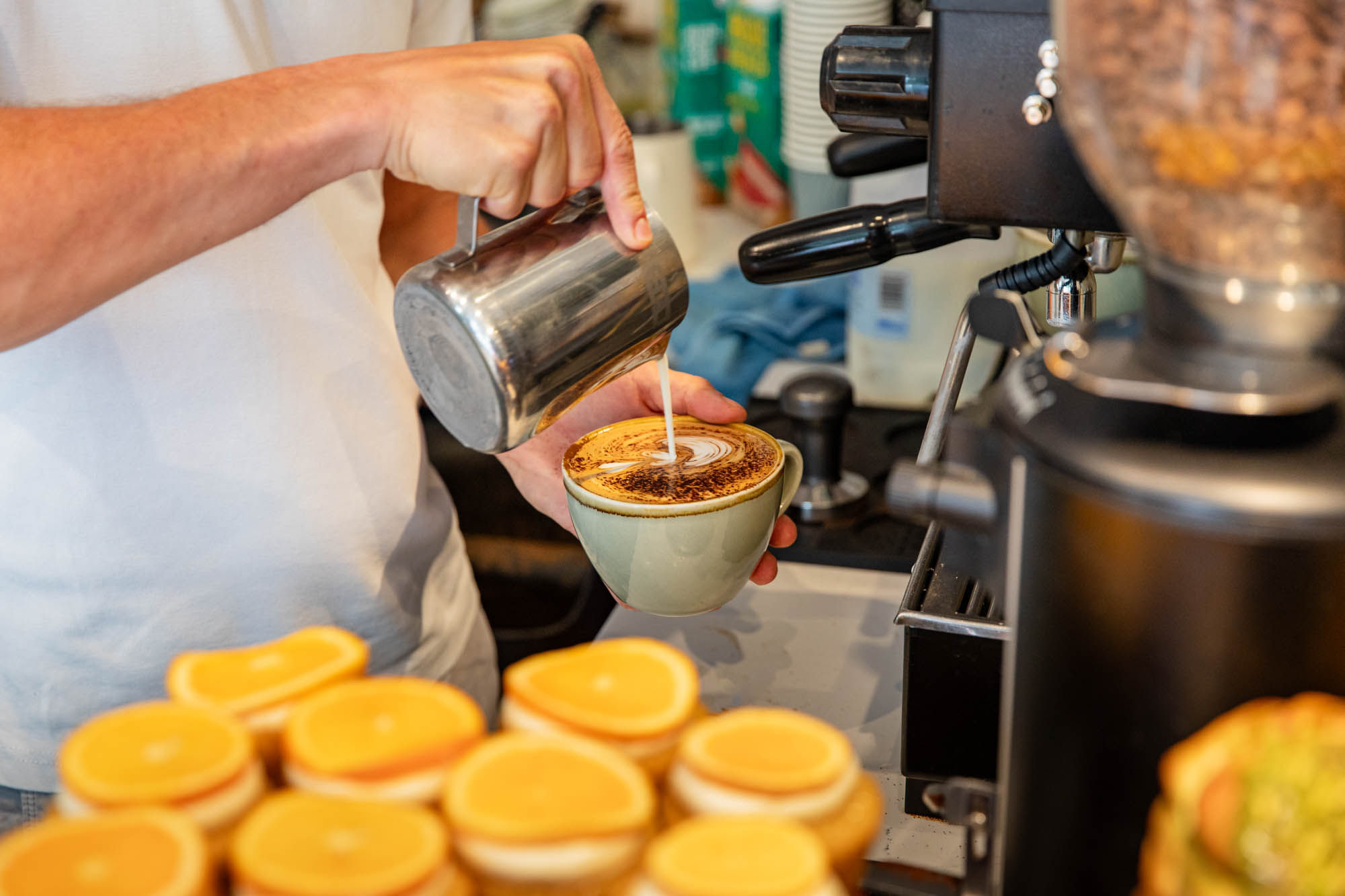 person making a flat white coffee at Jacob's Bakery