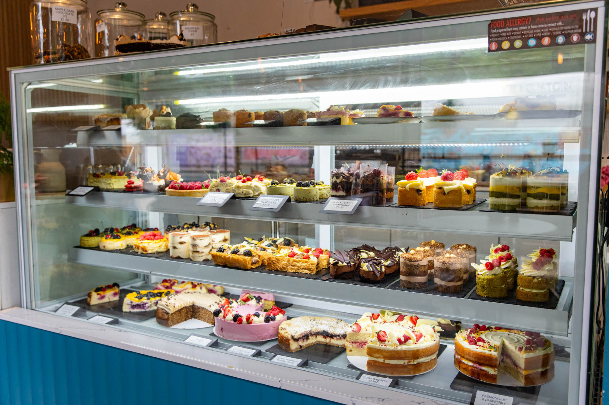 fridge full of various cakes at Jacob's Bakery