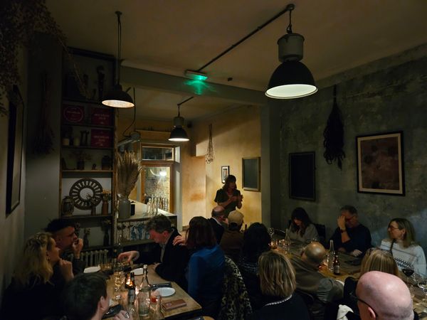 Wanderlust Supper Club at The Set, Cecily talking to participants of this supper club