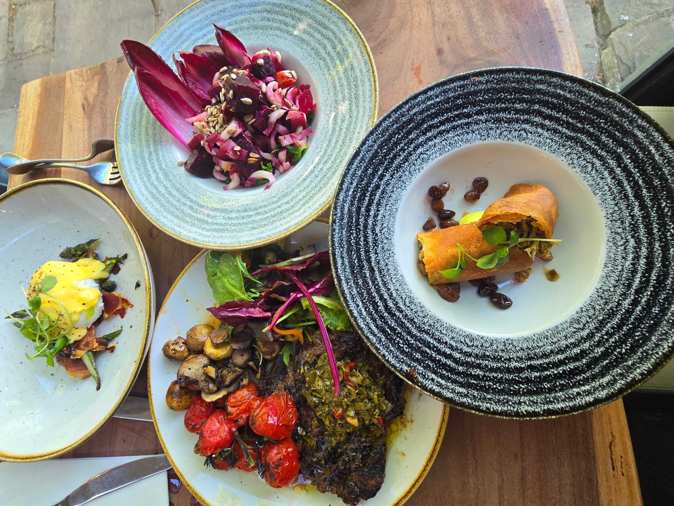 a over head shot of the table at Jolly Sportsman laid out with multiple dishes