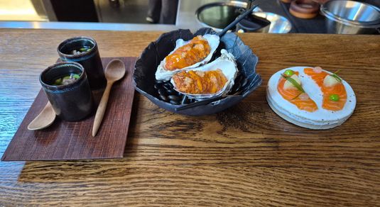 three little "snacks" dishes served on the table of Furna