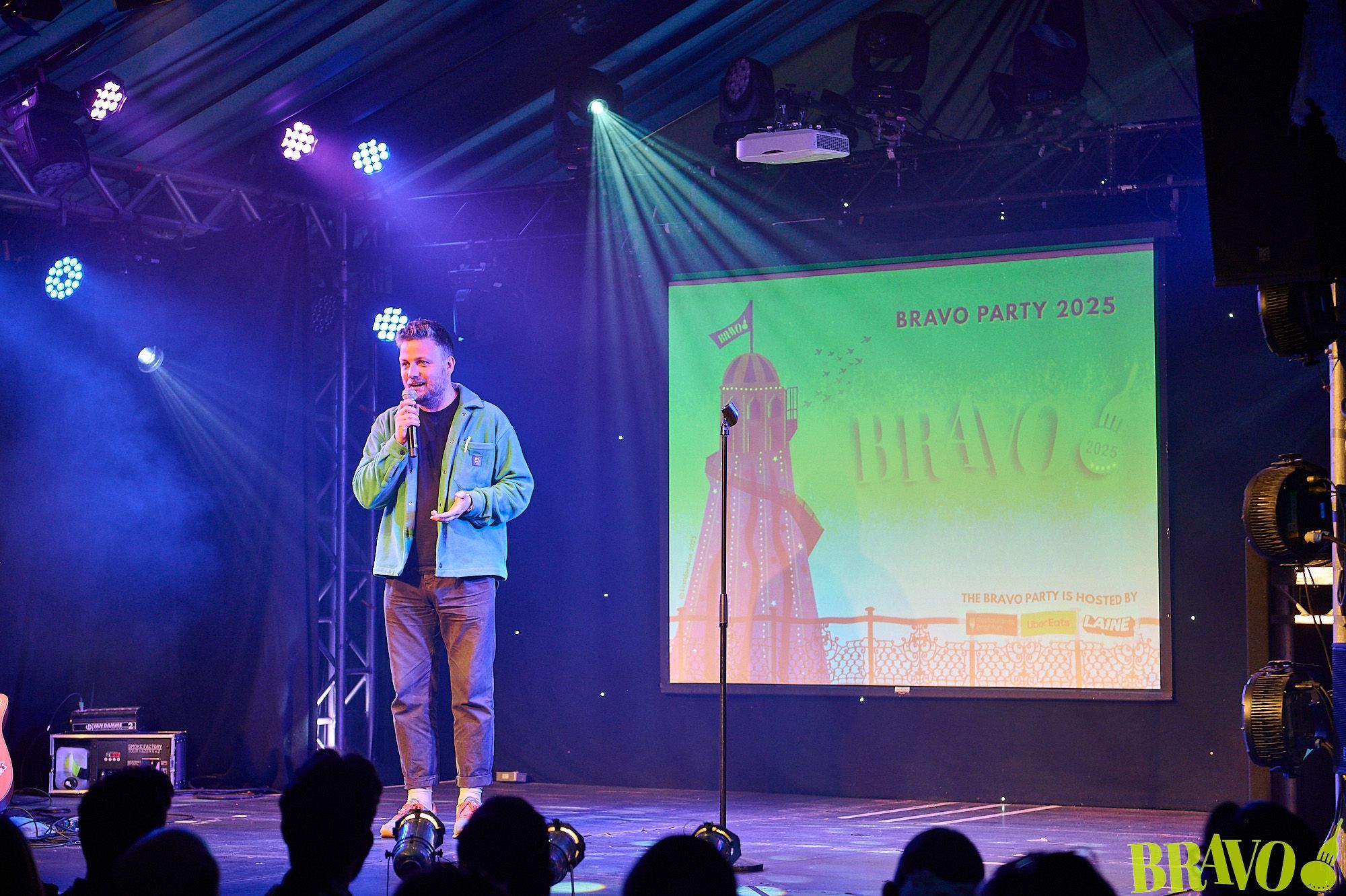 a man on the bravo stage having a speech