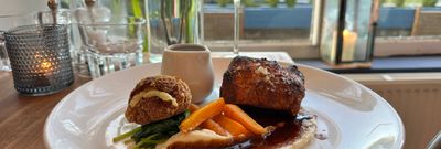 pork and belly served with glass of wine