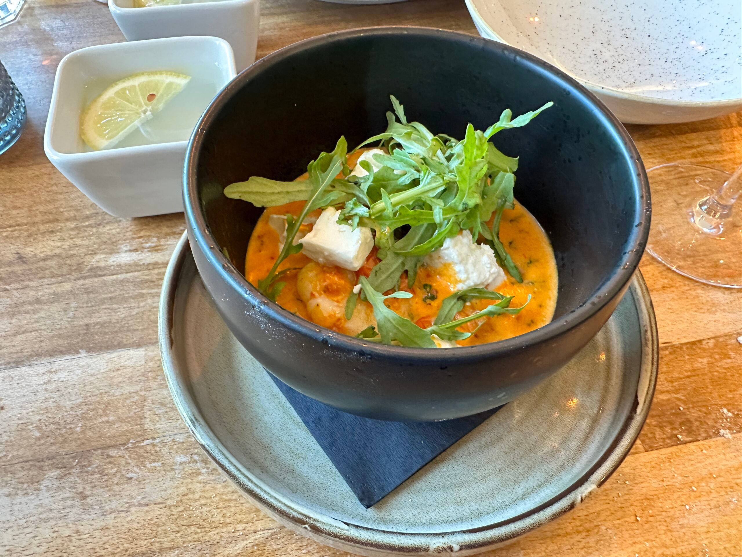 prawns served in black bowl