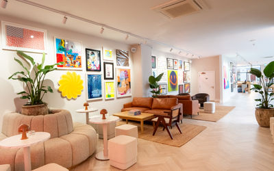 The bright interiors of Helm gallery with artwork on the wall.