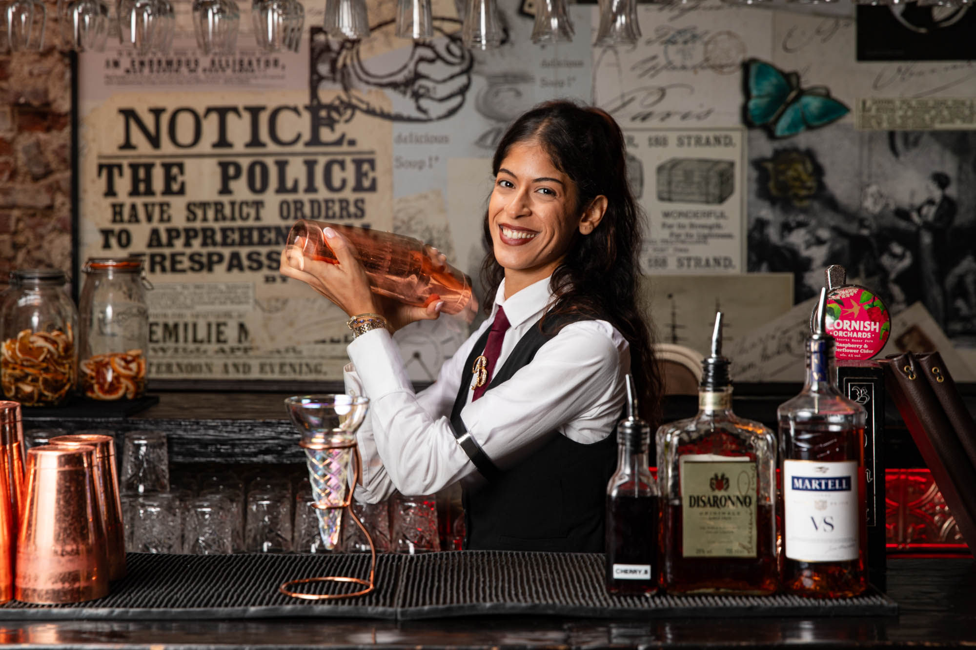 A cocktail being made at the bar