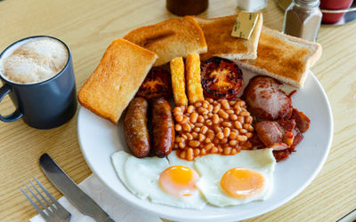 full english breakfast served with coffee at Roedean Cafe
