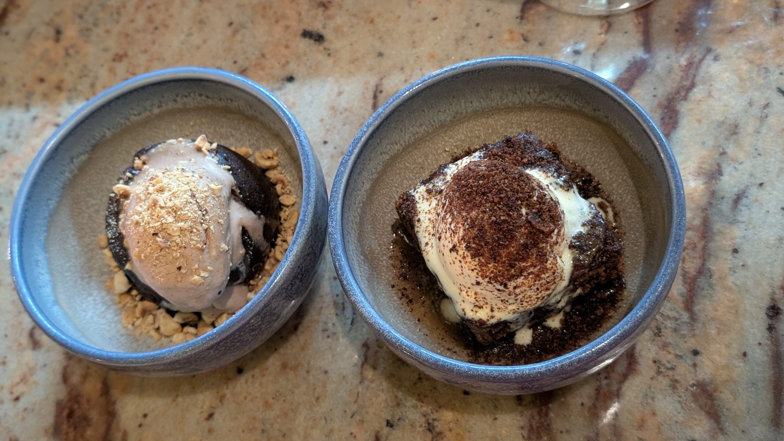 two desserts served in mini bowls