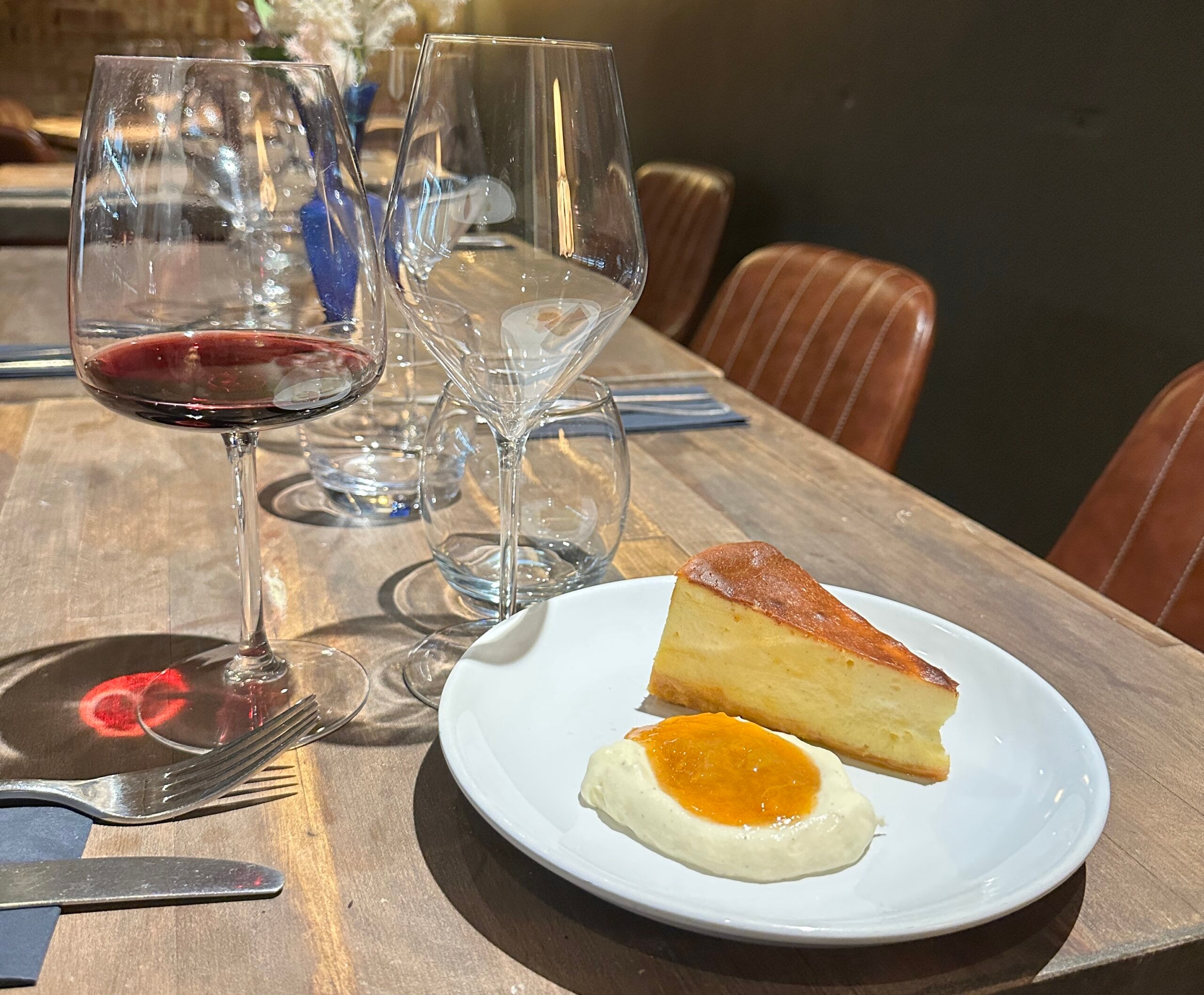 vanilla cheesecake served with glass of red wine. Photo from Barbino Brighton - Exclusive Pop-Up From Cin Cin’s Head Chef 