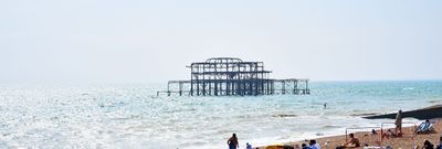 Brighton Beach - West Pier - people laying on the beach