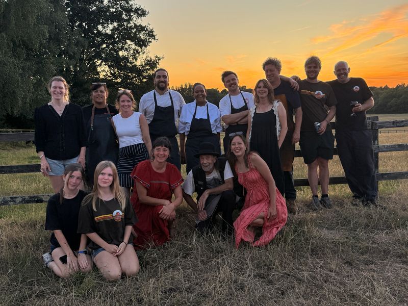 group photo of chefs, owners and participants of Woodfire feast 