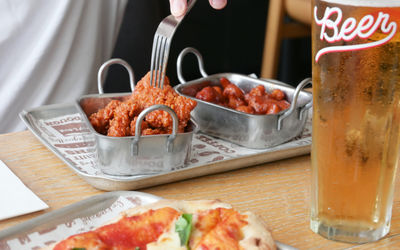 Plate of crispy fried chicken wings served at Bench Sports Bar Brighton