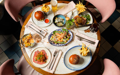 over head shot of the table laid out with lunch dishes at Burger and Lobster