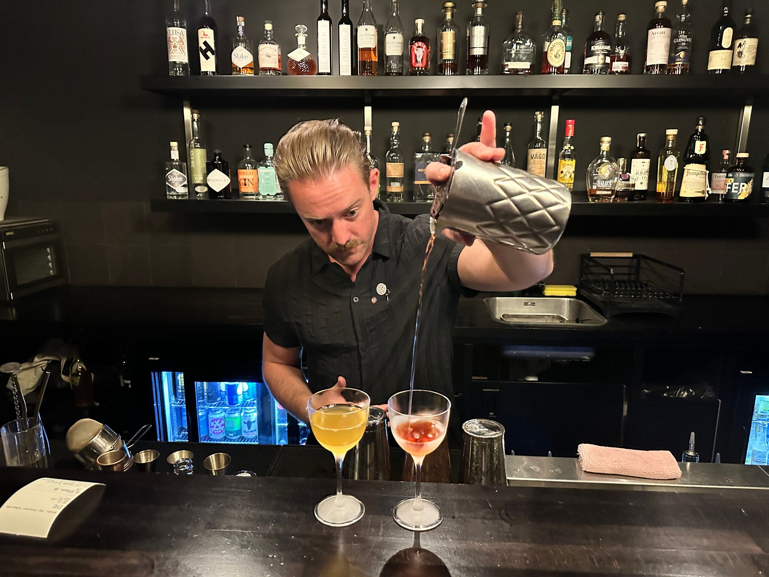 a bartender preparing cocktails