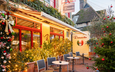 Christmas exterior lit up at Italian restaurant in The Lanes