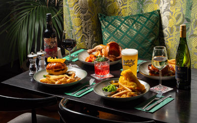 side shot of the table with various dishes at The Bell Tower Brighton