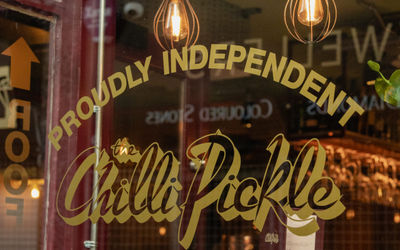 The Chilli Pickle displays ' Proudly Independent' in their window