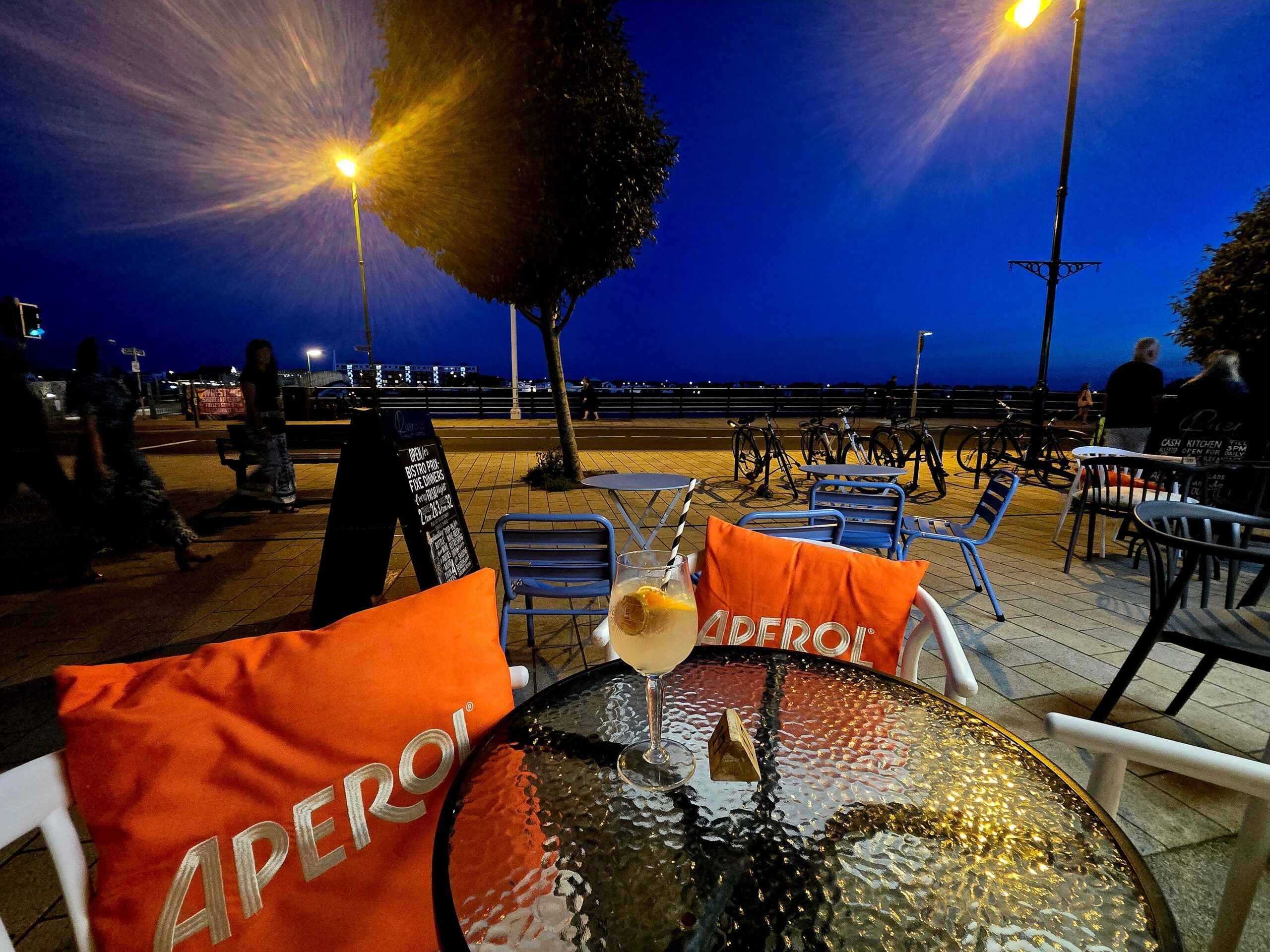 picure of cocktail on the outdoor table in the evening, thai night at River Cafe