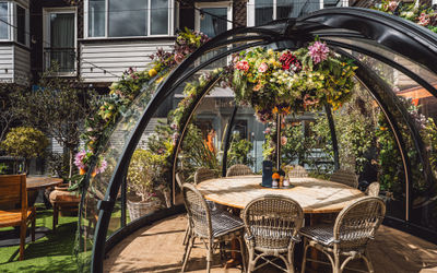 Alfresco igloo at Coppa Club Brighton in The Lanes decorated with summer flowers
