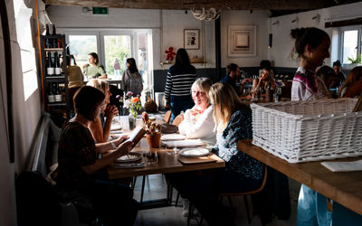 A dining room full of customers at Artelium Wine Estate