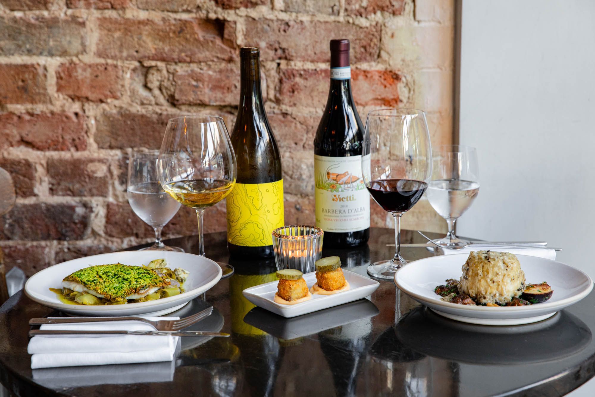side shot of the dishes and drinks served on the table at Wild Flor