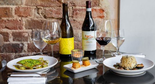 side shot of the dishes and drinks served on the table at Wild Flor
