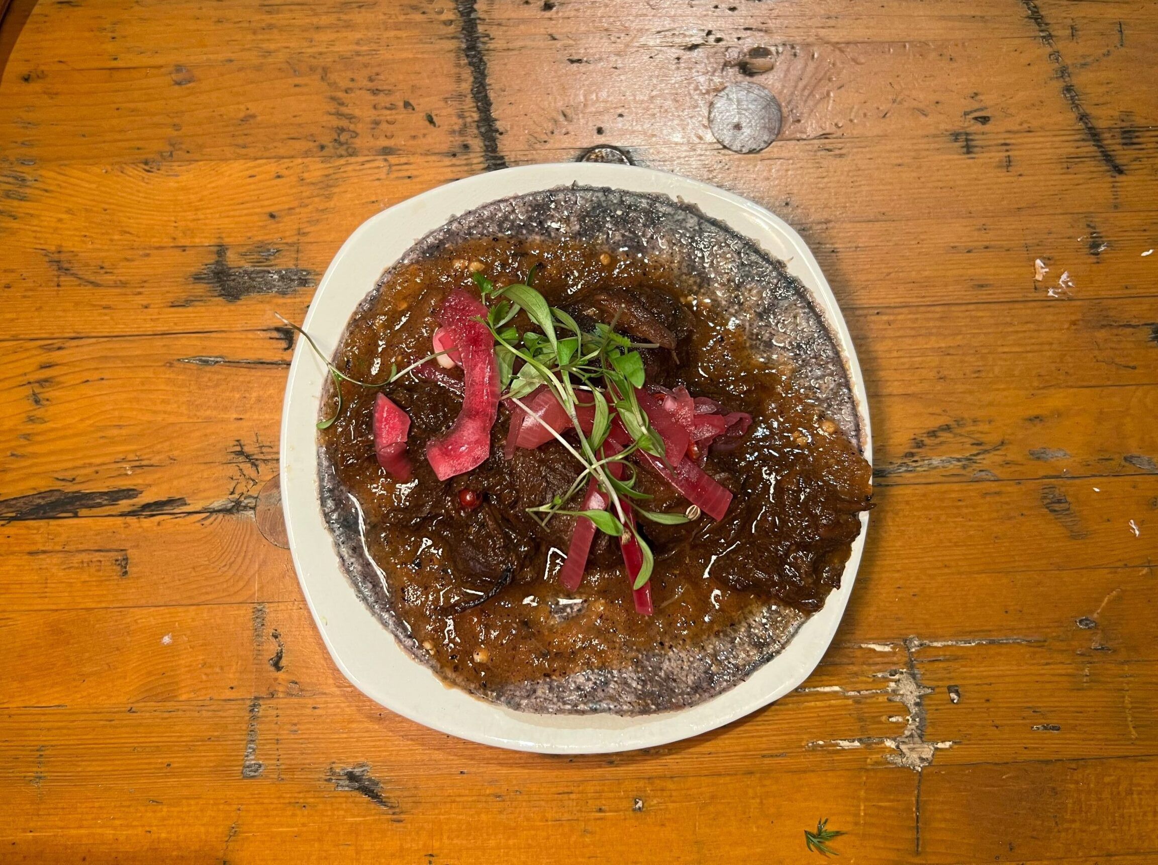 wild venison taco with pico de gallo and pink onions