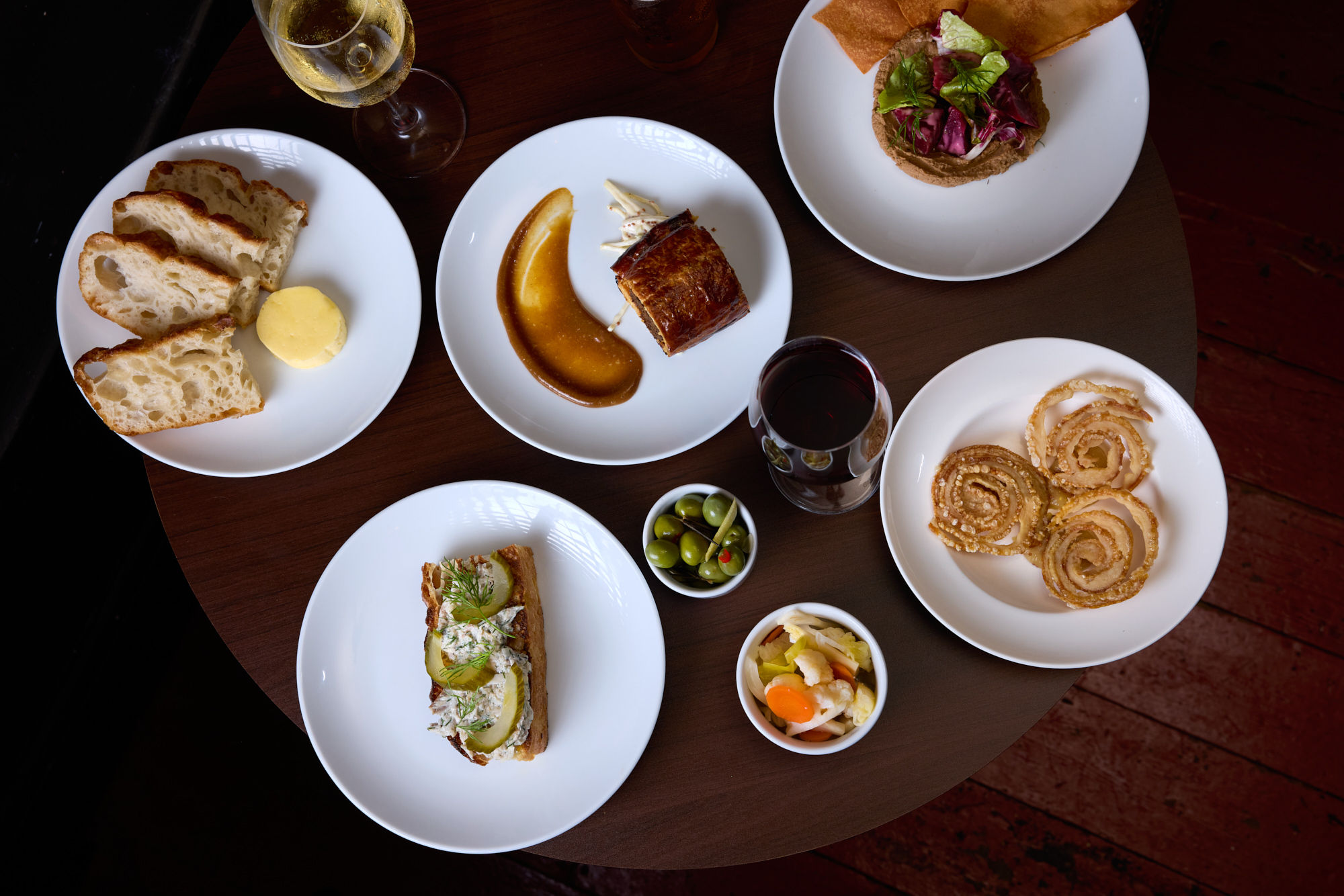 Small plates from Barbino. A selection of dishes photographed from above at The Windmill pub in Brighton 