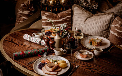 Pearly Cow, festive decorated table featuring various dishes and drinks