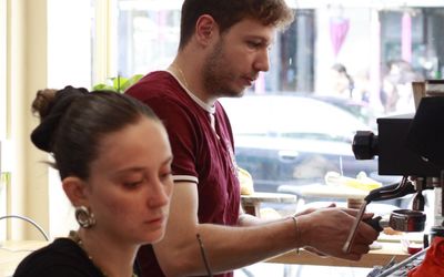 waiters preparing coffees at A Table