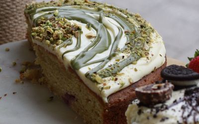 close up shot of pistachio cake at A table
