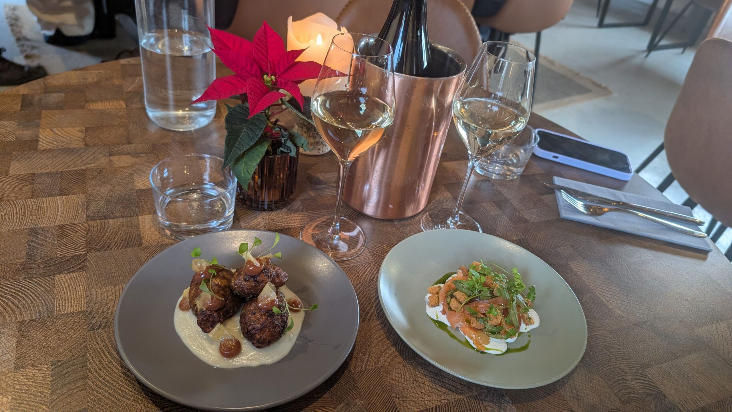 Jerusalem artichokes and juniper-cured salmon served on the table