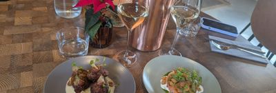 Jerusalem artichokes and juniper-cured salmon served on the table