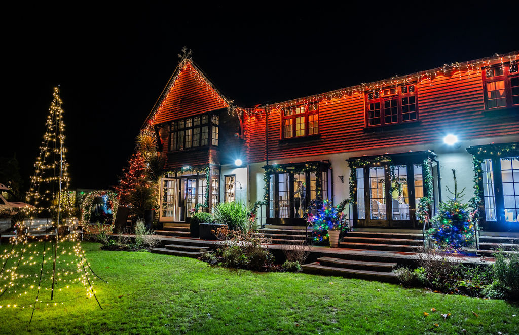 Christmas Light Display at Tottington manor, restaurant Terra. The restaurant lit up with cosy Christmas Lights.