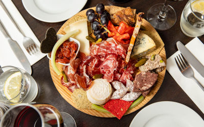 over head shot of the charcoal board served on the Petit Pois table