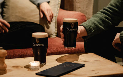 two people enjoying their Guinness beer