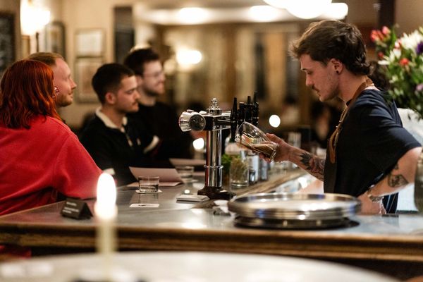 Bar person facing customers in this Brighton pub. New in 2025, The Crazy Goose