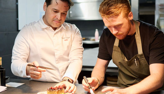 Rafael and Ewan Waller at the pass plating a dish up. Michelin star chefs in Brighton