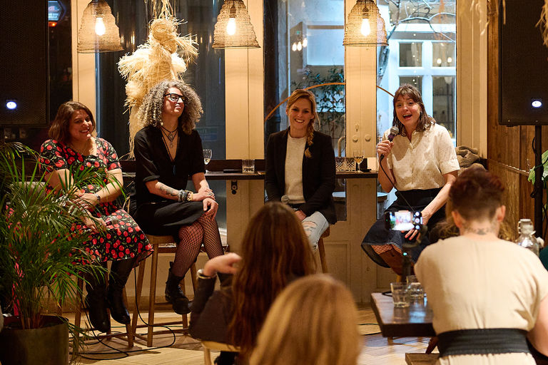 A panel of women discussing at an event hosted at Lost in The Lanes, Brighton.